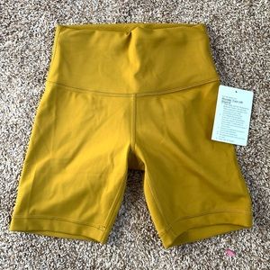Lululemon biker shorts!! Brand new never worn, the color is a mustard tone.